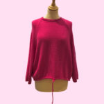 Pull en tricot rose fushia